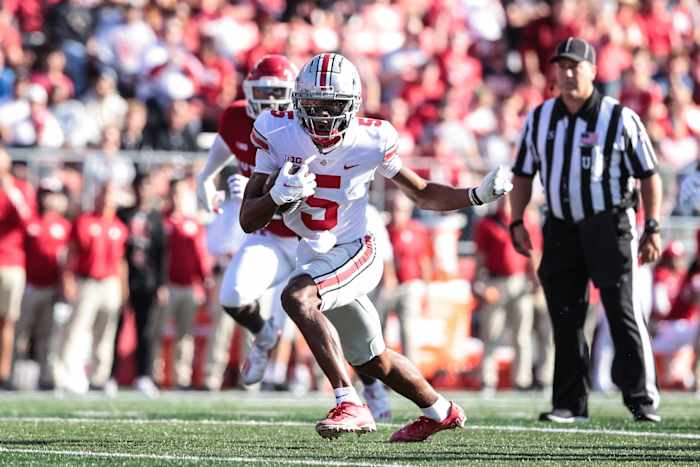 Ohio State WR Garrett Wilson jukes after catch